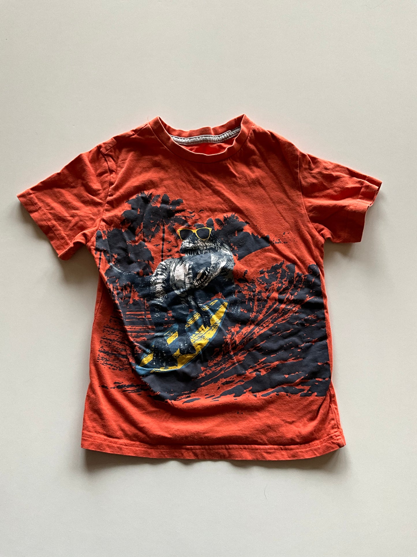 Orange Surfing Dino Tee