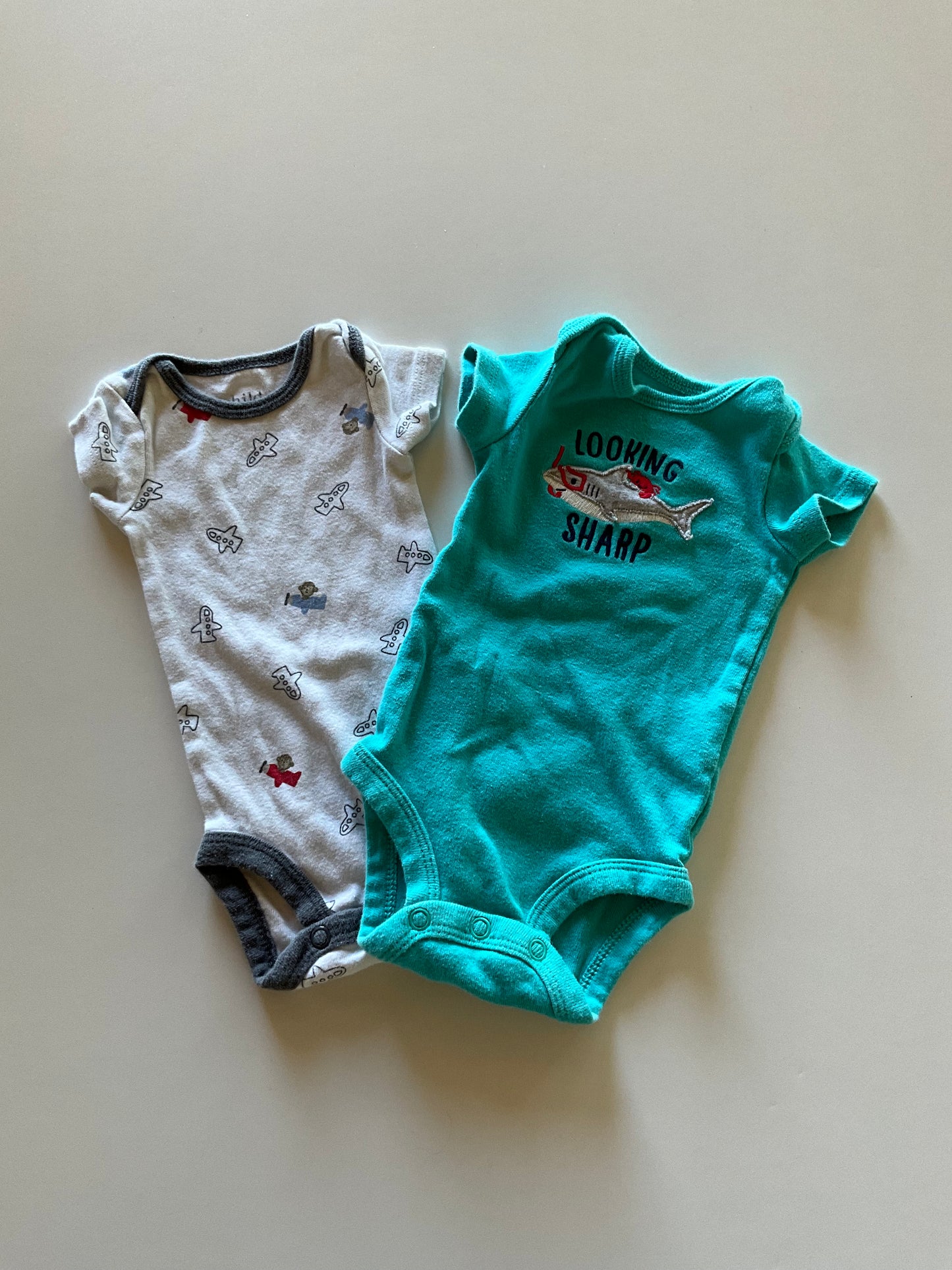 2 Newborn Onesies