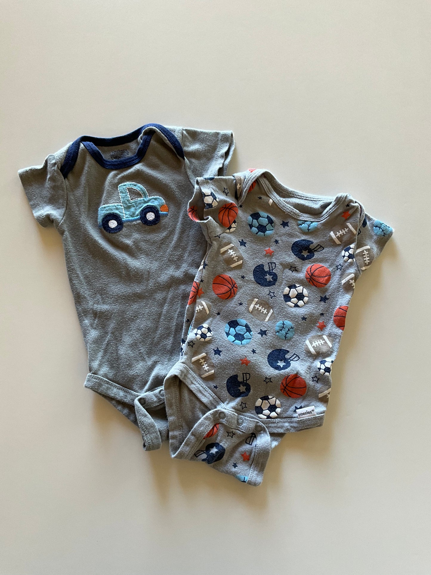 2 Grey Onesies