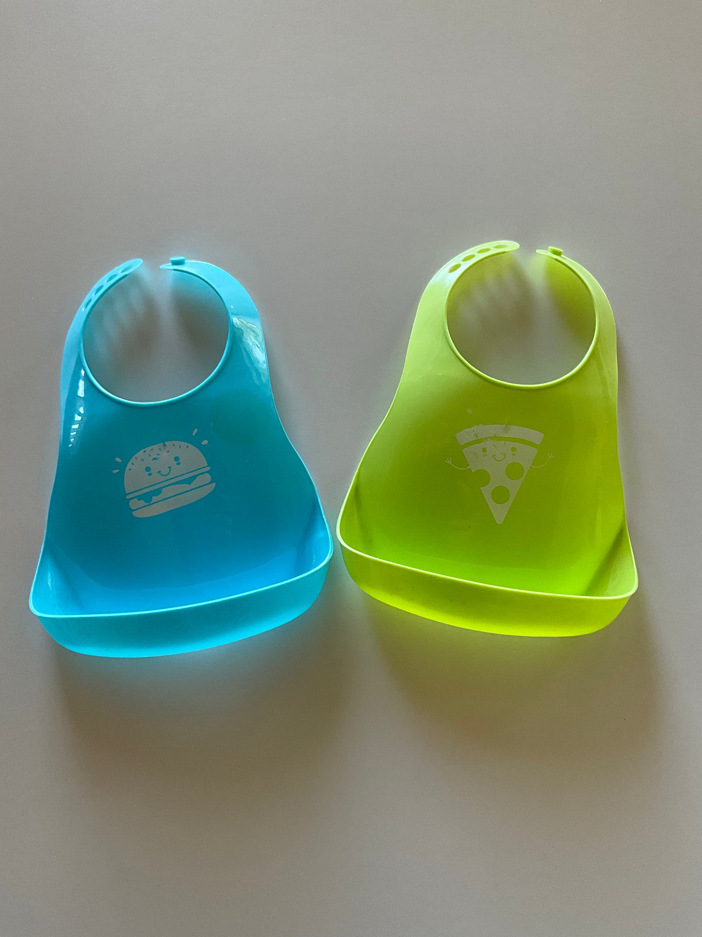 2 Plastic Bibs