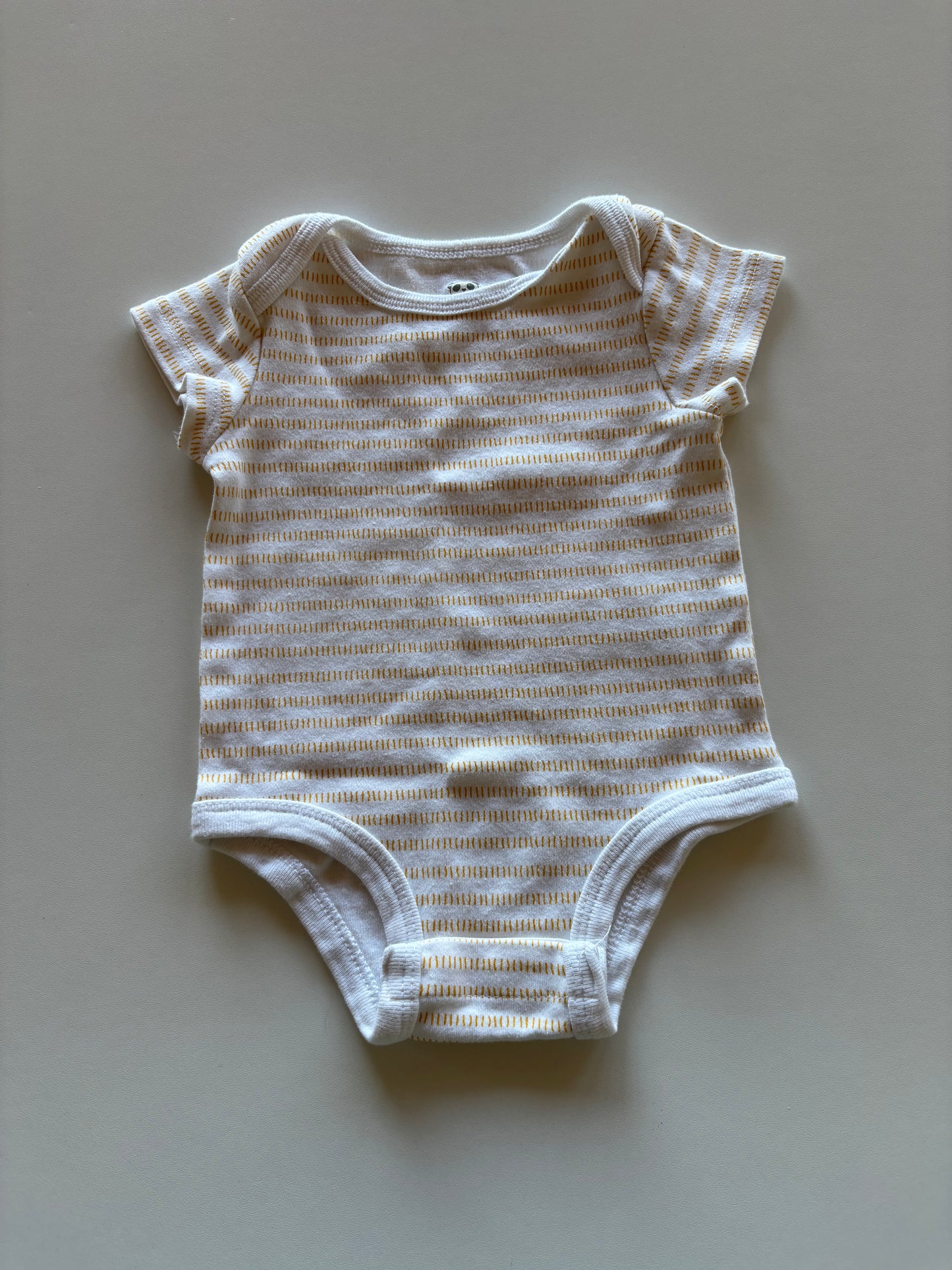White & Yellow Patterned Onesie
