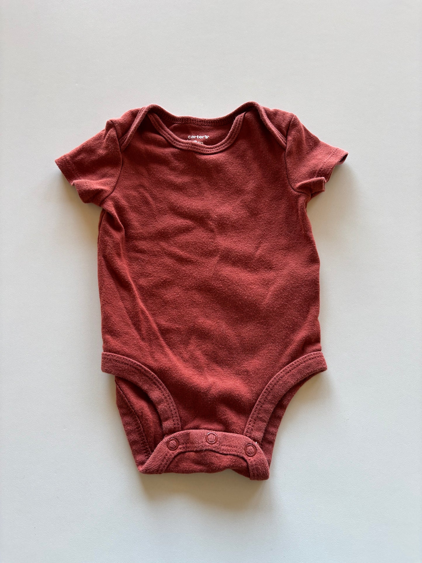 Brick Coloured Onesie