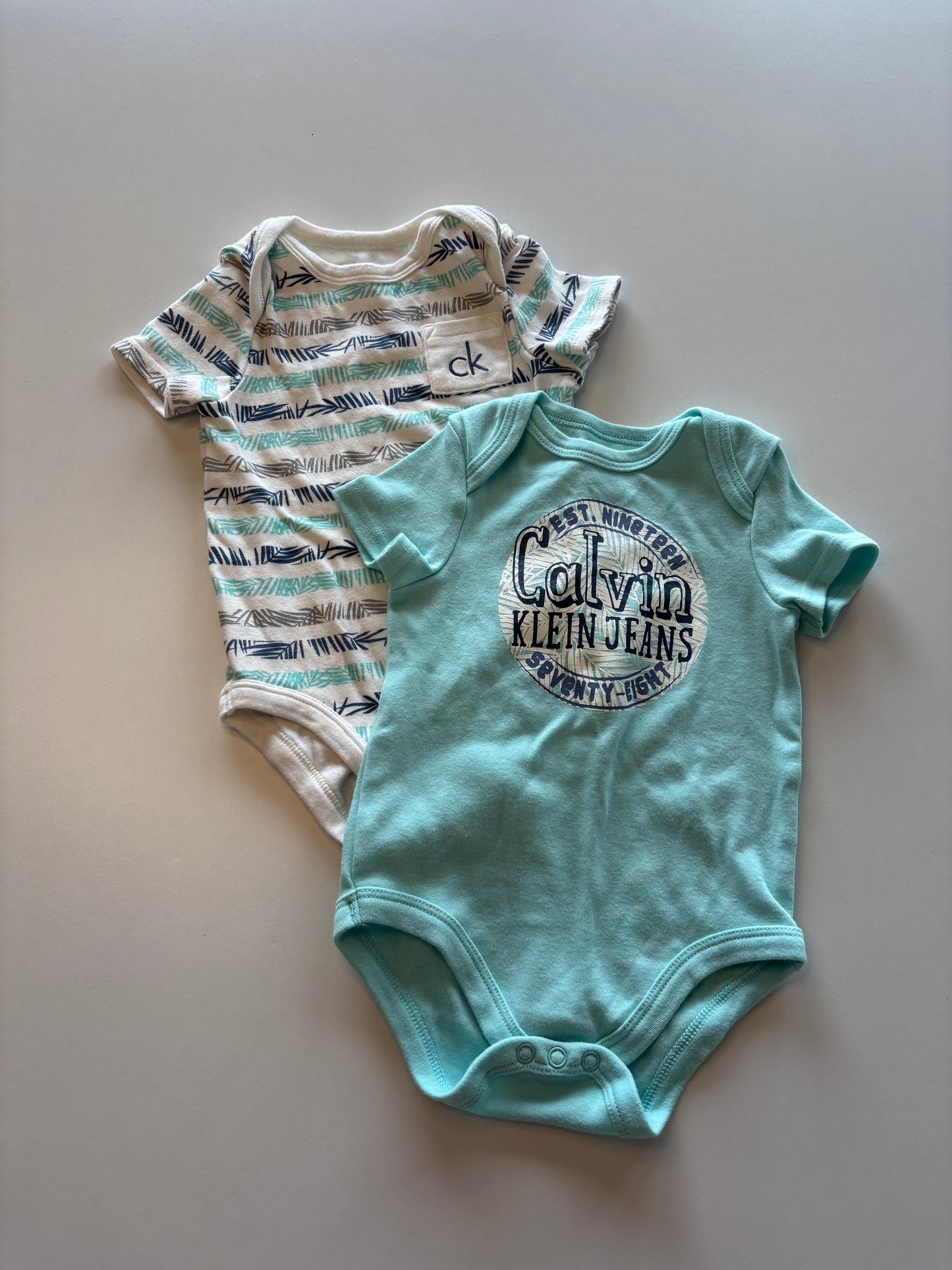 2 CK Onesies