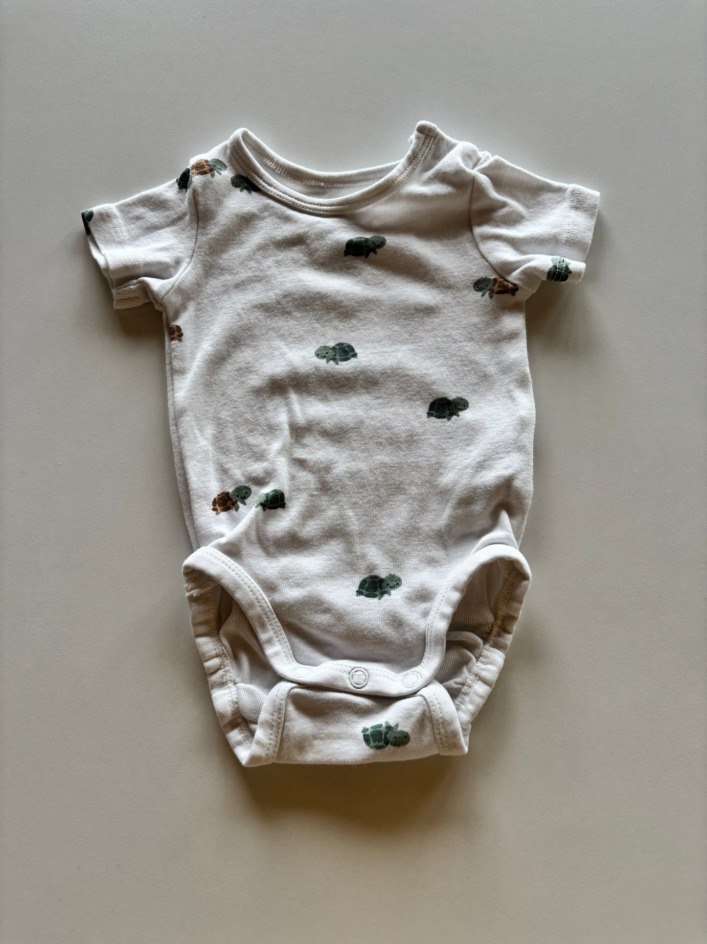 White Turtle Onesie