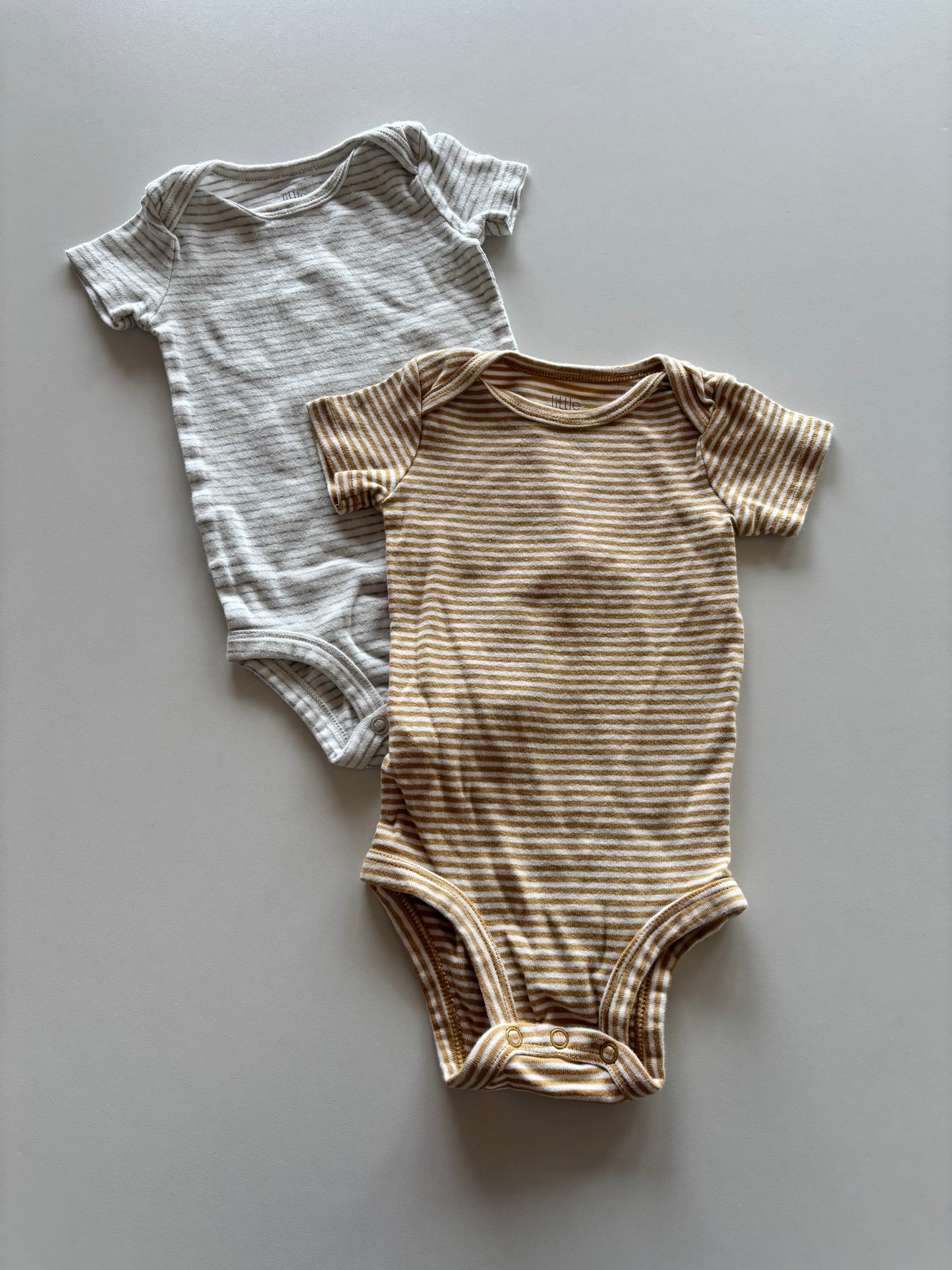 2 Neutral Striped Onesies