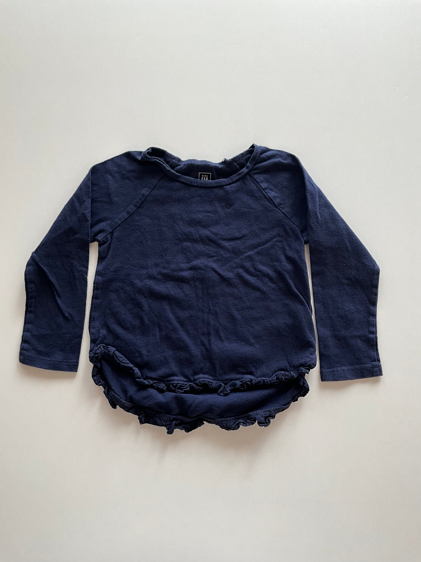 Navy Ruffle Hem Shirt