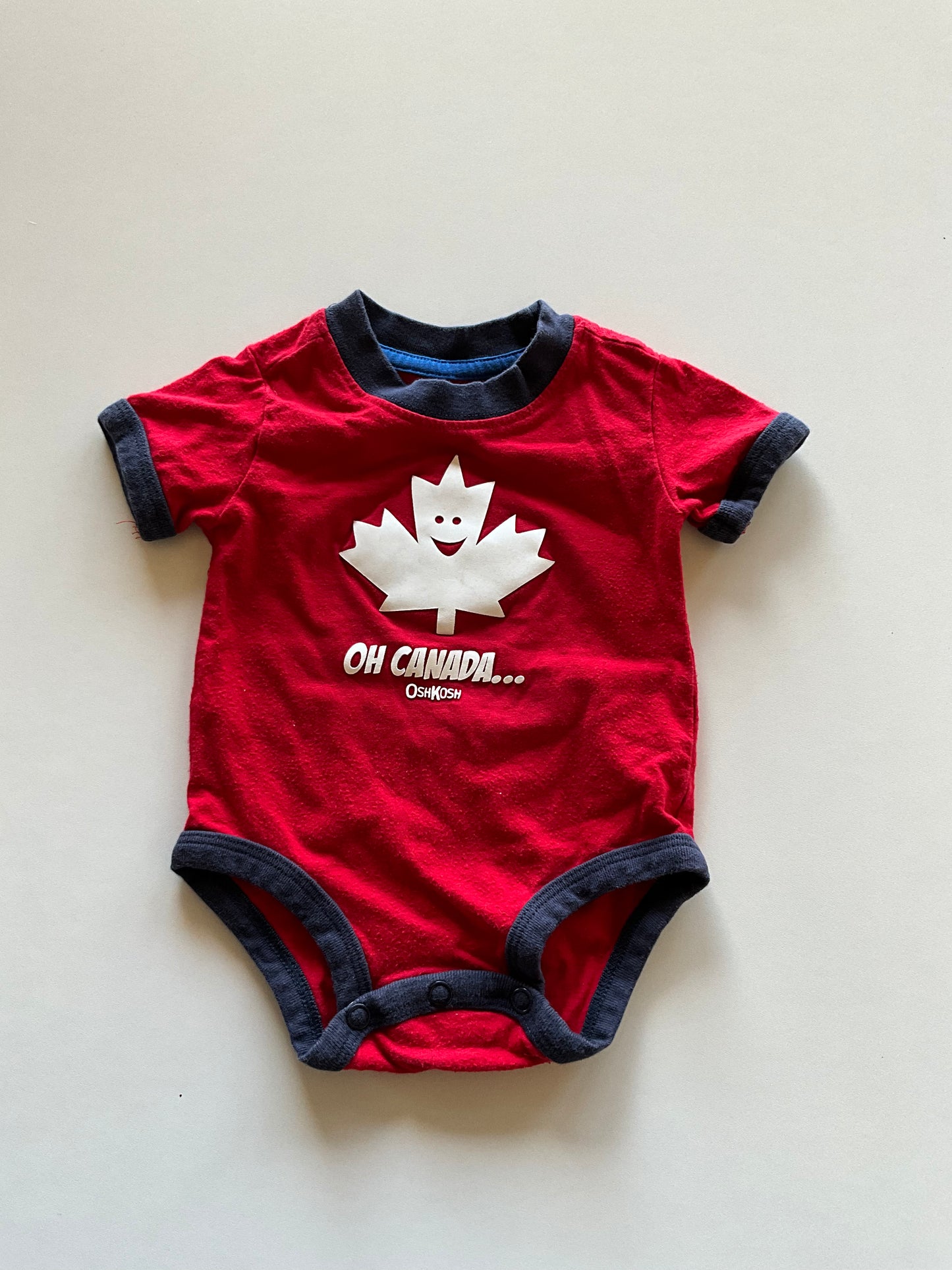 Red Oh Canada Onesie